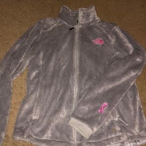 light gray and pink breast cancer north face coat